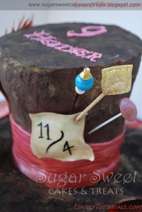 Название: 7Alice in Wonderland Mad Hatter Hat Cake (tag) b.jpg
Просмотров: 2

Размер: 133.0 Кб